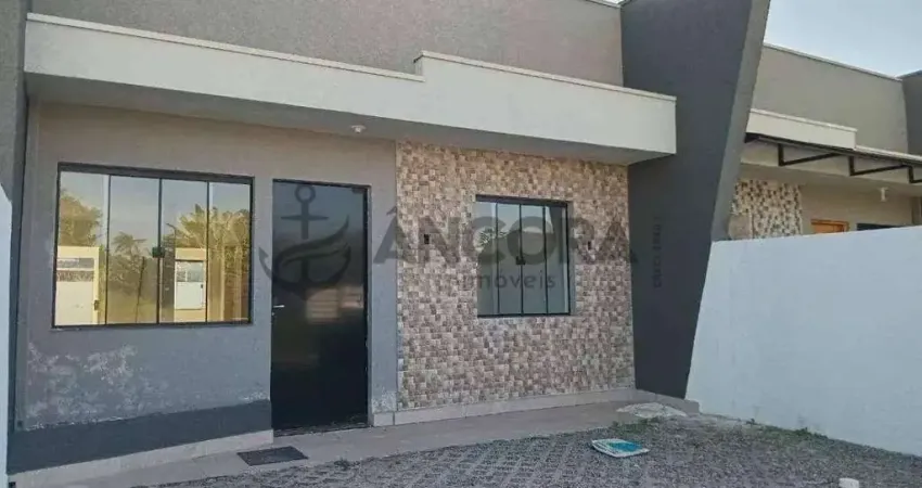 Casa bem localizada com 3 quartos, à venda no Balneário Cambiju