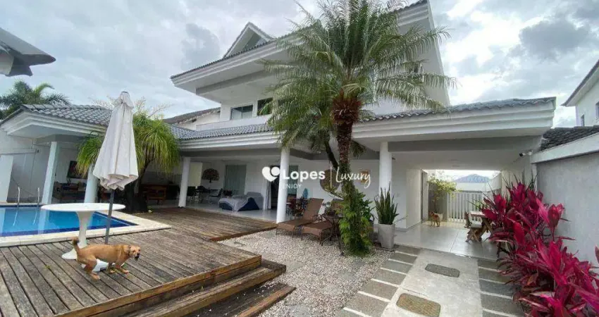 Maravilhosa casa com 4 quartos sendo 3 suítes em condomínio fechado em vargem pequena