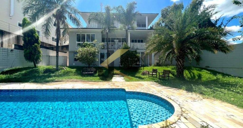Casa à venda no condomínio Alphaville Campinas, 5 dormitórios (4 suítes), piscina e garagem para vários carros