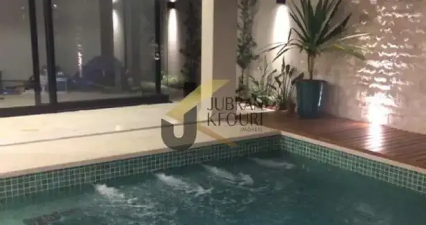 Casa à venda em condomínio de Hortolândia, 4 suítes, piscina e 4 garagens