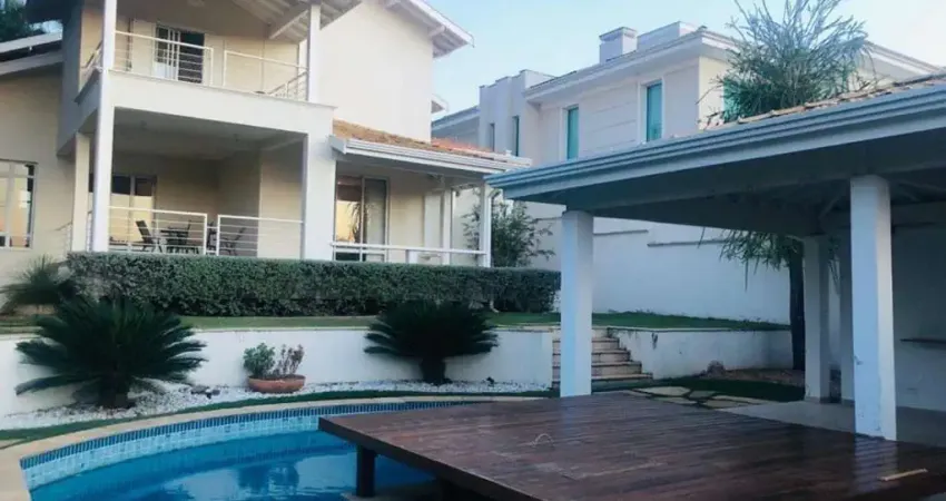 Casa no Alphaville Campinas para venda, com 4 suítes (1 suíte - máster com closet), piscina, espaço gourmet e 4 garagens.