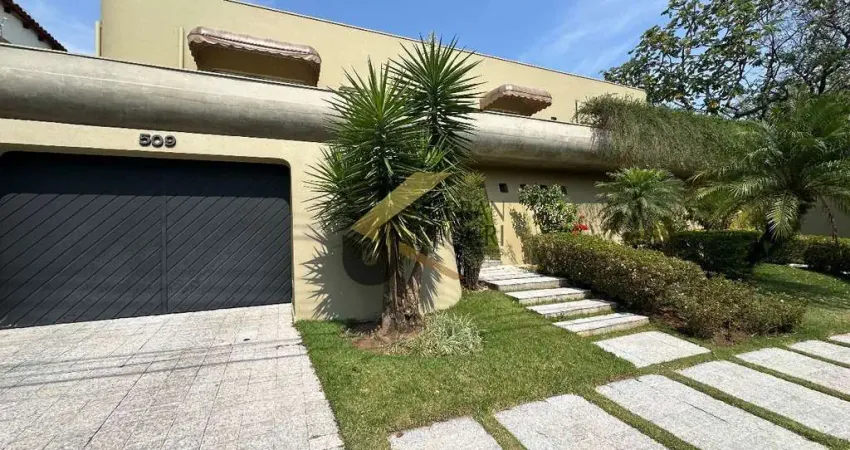 Casa em condomínio à venda no Parque Nova Campinas, com 4 suítes, lazer privativo, elevador e garagem para vários carros.