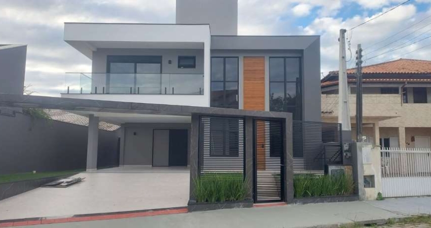 Casa com 3 suítes no bairro Carianos em Florianópolis SC