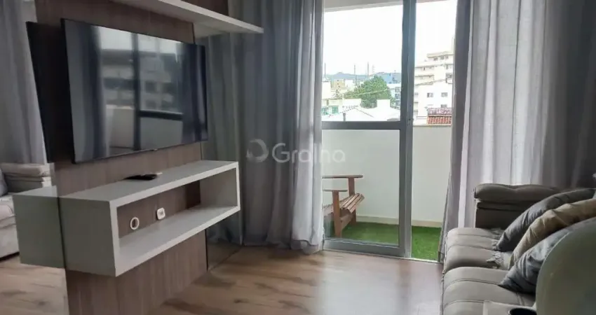 Apartamento de 65m² com 2 quartos sendo 1 suíte no bairro Pagani em Palhoça/SC