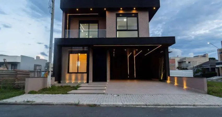 Sobrado com 3 dormitórios, incluindo uma suíte, garagem para 4 vagas no umbara