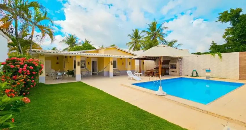 Venha viver o estilo de vida dos seus sonhos nesta deslumbrante casa térrea de 4 quartos, sendo 3 suítes, localizada na renomada Praia de Guarajuba.
