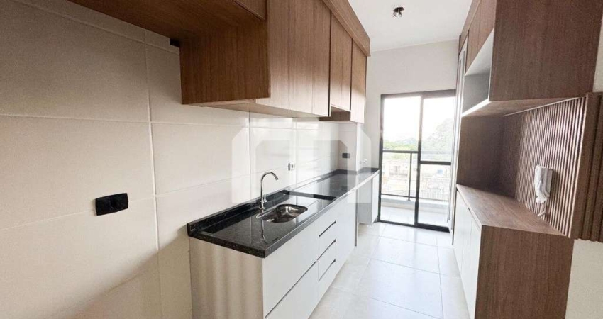 Apartamento 2 dormitórios com vaga de garagem e varanda com móveis planejados