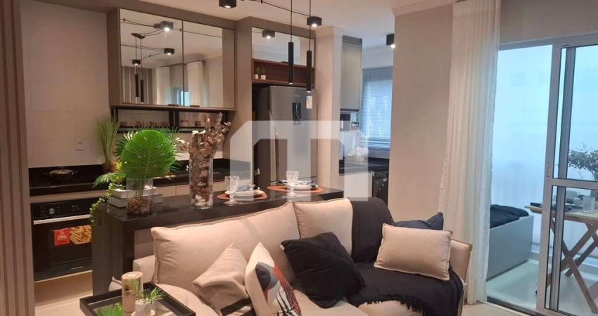 Apartameno a venda de 55 m², 2 dormitórios, ampla sala 2 ambientes com churrasqueira e 1 vaga.