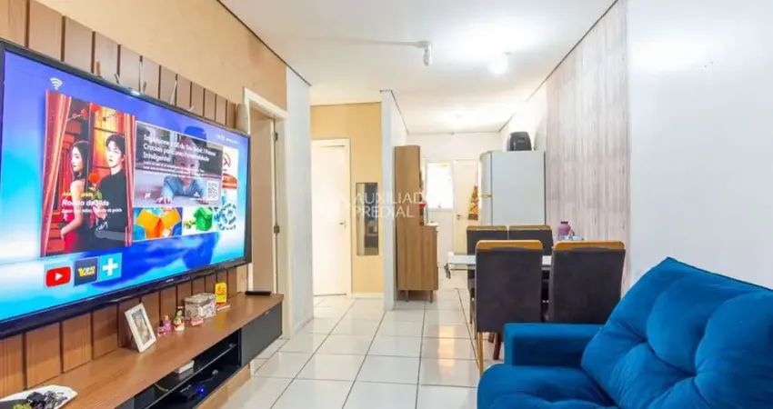 Casa com 2 quartos à venda na Rua Magnólia, 14, Chácara das Rosas, Cachoeirinha