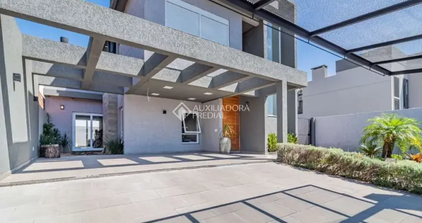Casa com 3 quartos à venda na Avenida Bromélias, 456, Parque da Matriz, Gravataí