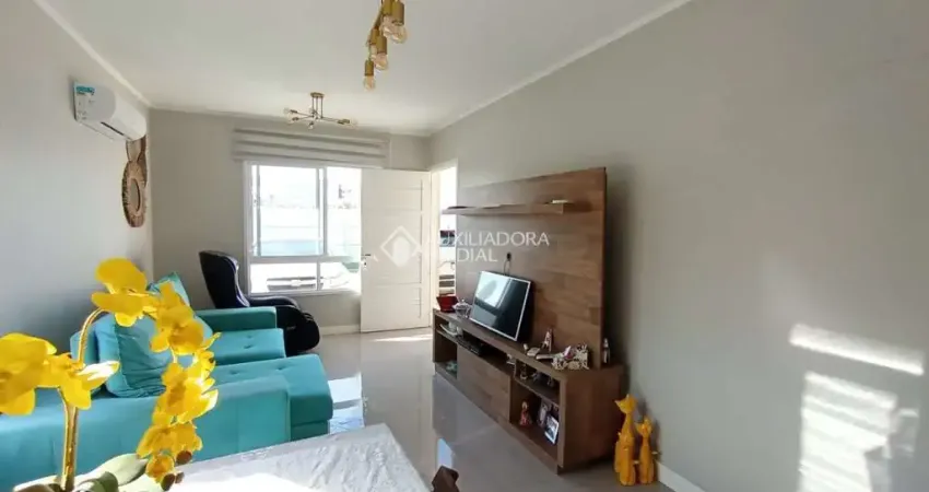 Casa em condomínio fechado com 3 quartos para alugar na Avenida Vereador Clóvis Elias Prytula, 325, Central Parque, Cachoeirinha