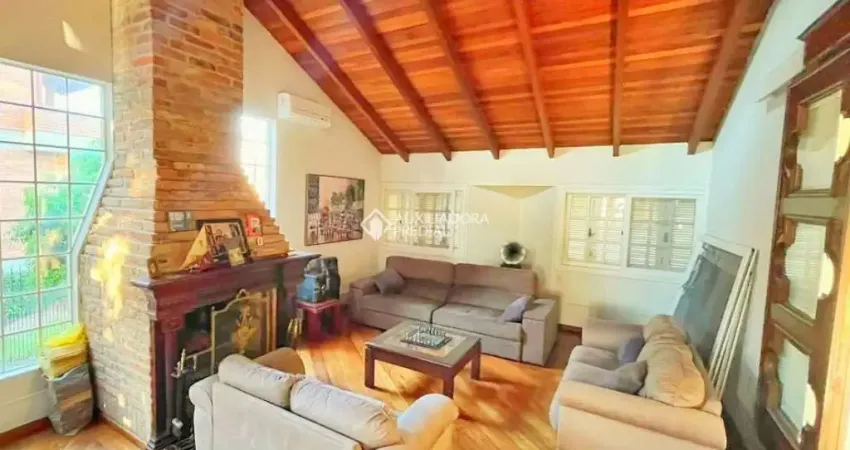 Casa em condomínio fechado com 3 quartos à venda na Rua Tocantins, 937, Lomba do Pinheiro, Porto Alegre