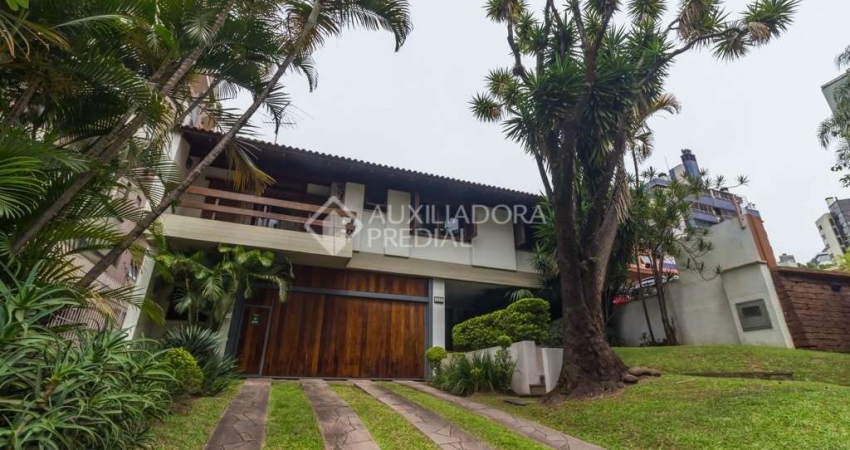 Casa em condomínio fechado com 4 quartos à venda na Rua Carlos Trein Filho, 1255, Auxiliadora, Porto Alegre