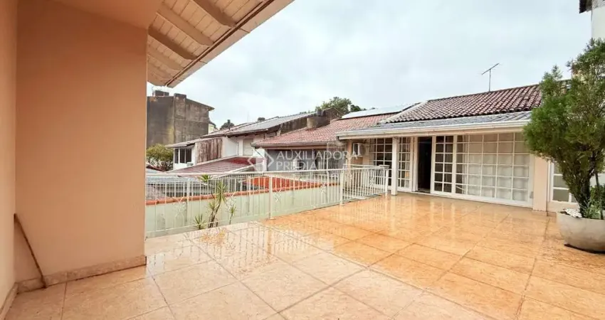 Casa com 3 quartos à venda na Rua Álvaro Domingues, 104, Parque Santa Fé, Porto Alegre