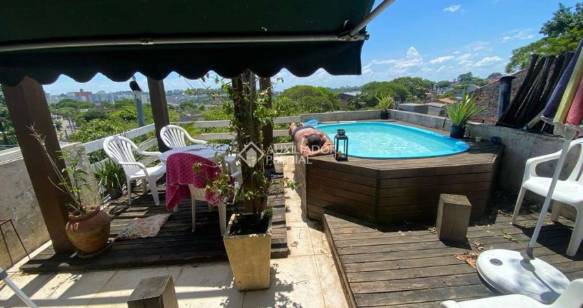 Casa com 3 quartos à venda na Rua Natércia Cunha Veloso, 267, Morro Santana, Porto Alegre