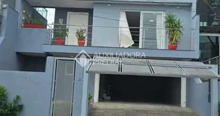Casa em condomínio fechado com 4 quartos à venda na Rua Walter Porto Filho, 240, Mário Quintana, Porto Alegre