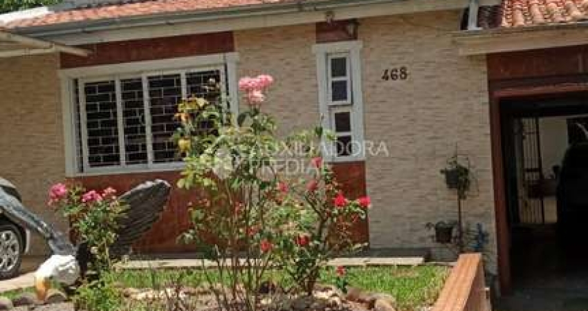 Casa com 5 quartos à venda na Rua Tupi, 468, Vila Monte Carlo, Cachoeirinha