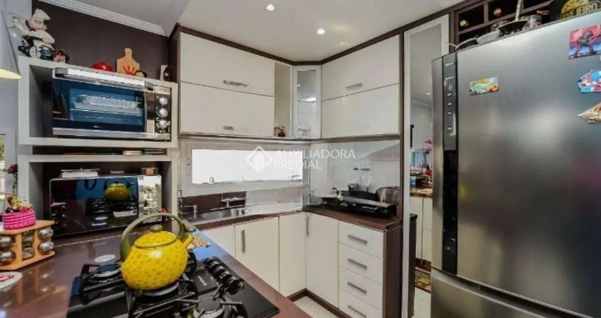 Casa com 2 quartos à venda na Rua Guadalajara, 585, Jardim Itu Sabará, Porto Alegre