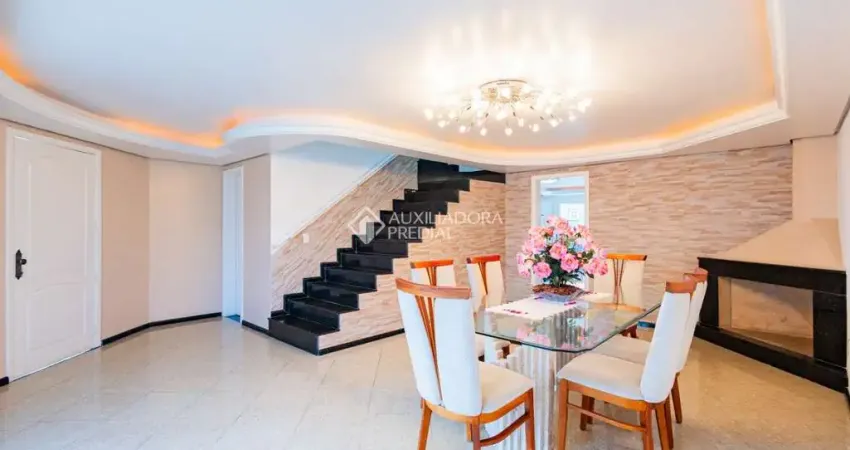 Casa com 3 quartos à venda na Rua Santo Expedito, 63, Parque Santa Fé, Porto Alegre