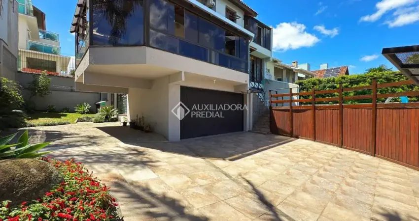 Casa em condomínio fechado com 3 quartos à venda na Rua Alcebíades Antônio dos Santos, 356, Nonoai, Porto Alegre