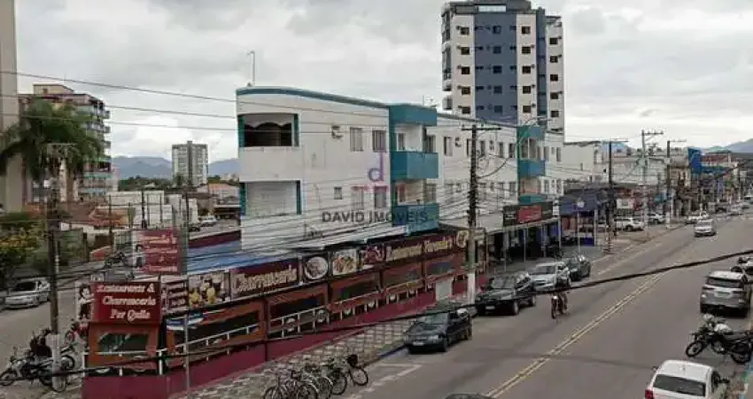 Apartamento Centro, com dois dormitórios, sendo uma suíte, sem vaga de garagem.