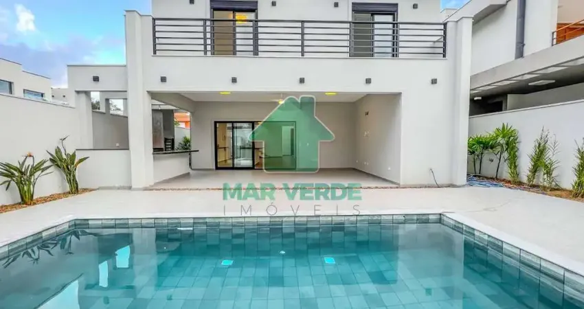 Sobrado novo 4 dorm sendo 3 suítes com piscina em condomínio costa nova