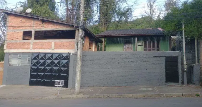 Casa com 2 dormitórios, 100 m² - venda por R$ 430.000,00 ou aluguel por R$ 2.797,00/mês - Vila Nova - Novo Hamburgo/RS