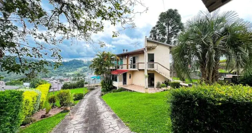 Casa com 2 dormitórios, 200 m² - venda por R$ 800.000,00 ou aluguel por R$ 3.685,00/mês - Floresta - Estância Velha/RS