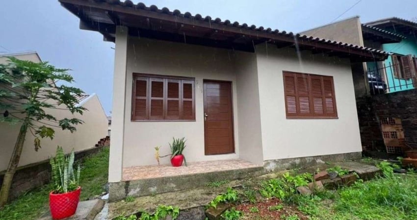 Casa com 3 dormitórios para alugar, 65 m² por R$ 1.315,00/mês - Campo Grande - Estância Velha/RS