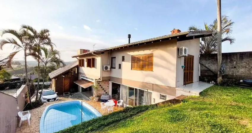Casa com 4 dormitórios à venda, 248 m² por R$ 690.000,00 - Encosta do Sol - Estância Velha/RS