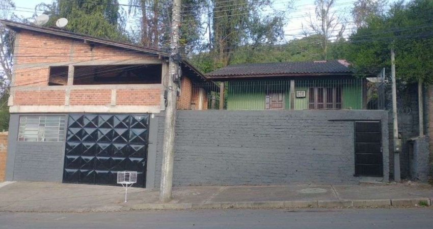 Casa com 2 dormitórios, 100 m² - venda por R$ 430.000,00 ou aluguel por R$ 2.797,00/mês - Vila Nova - Novo Hamburgo/RS