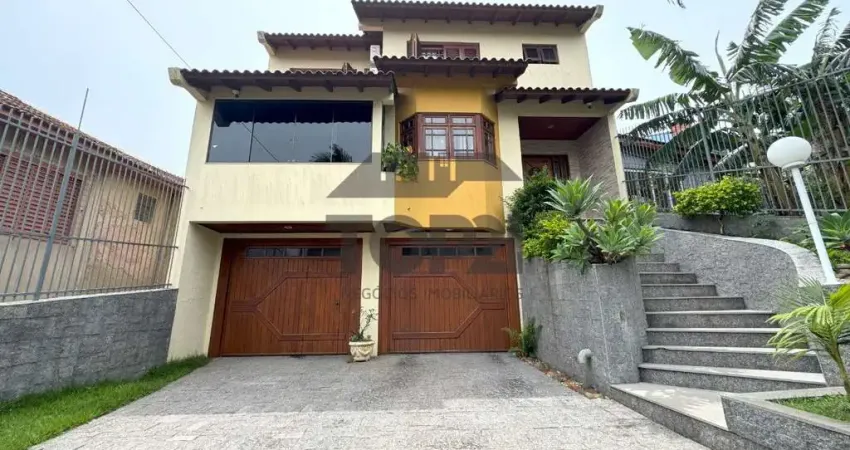 Casa com 4 quartos à venda na Rua Zeferino Dias, 390, Sarandi, Porto Alegre