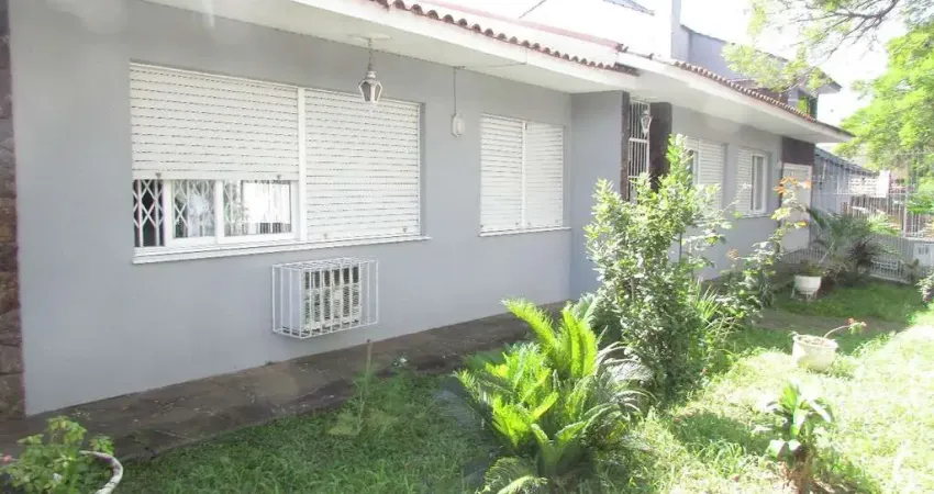 Casa comercial com 8 salas para alugar na Rua Engenheiro Frederico Dahne, 565, Sarandi, Porto Alegre