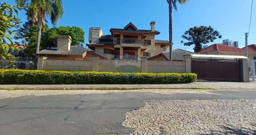 Casa com 4 quartos à venda na Rua Paissandu, 361, Partenon, Porto Alegre