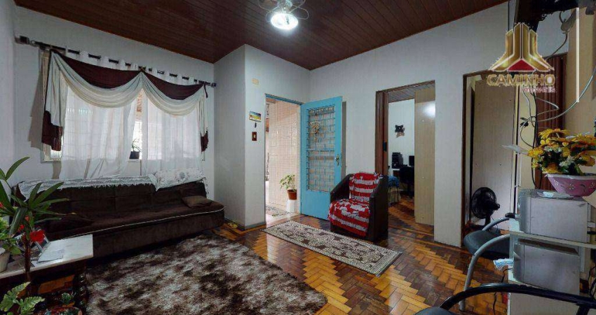 Vendo casa de dois dormitórios e oito vagas de garagem, bairro Sarandi em Porto Alegre