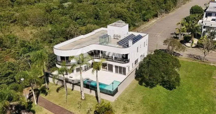 Casa tríplex com 4 suítes - jurerê internacional - florianópolis