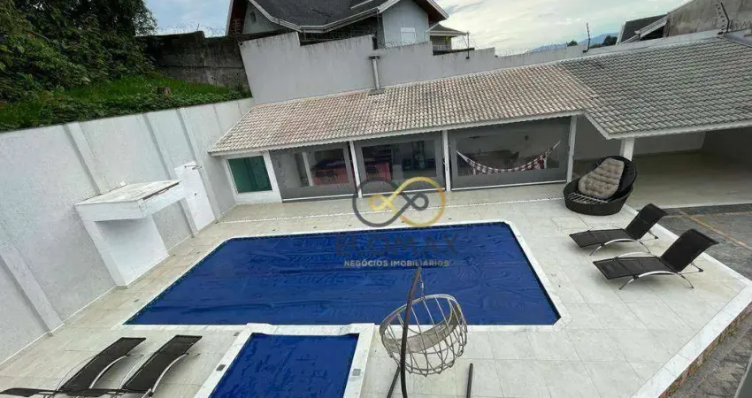 Sobrado com 4 dormitórios à venda, 550 m² por R$ 4.850.000,00 - Caputera - Arujá/SP