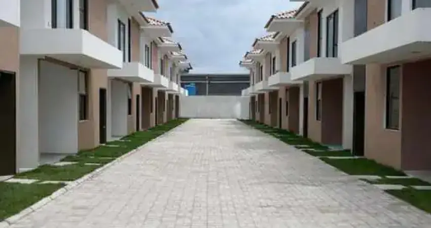 Casa com 3 dormitórios à venda, 116 m² por R$ 820.000 - Buraquinho - Lauro de Freitas/BA