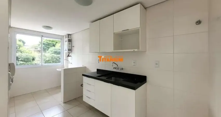 Apartamento com dois dormitórios e vaga coberta próximo à Feevale para aluguel bairro Vila Nova