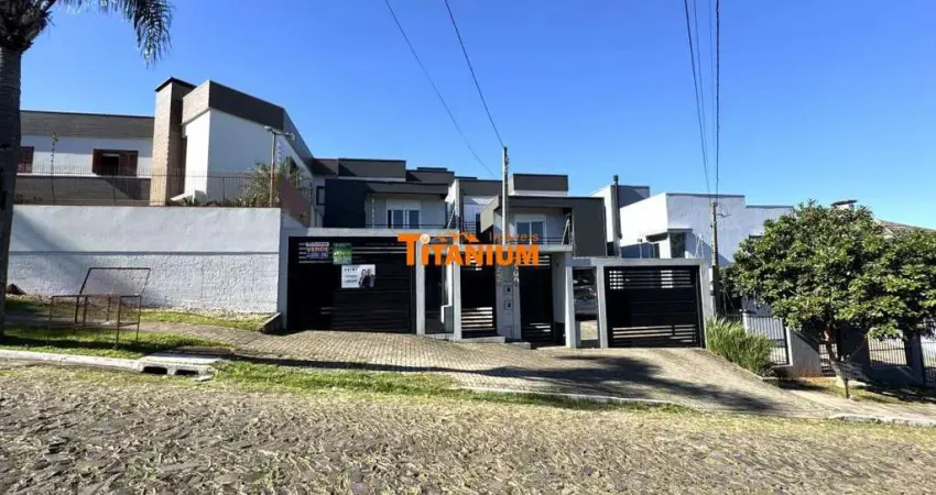 Casa com 3 dormitórios, sendo duas suítes uma com closet, todos dormitórios com sacada, pátio, ótima localização à venda em novo hamburgo, ideal.