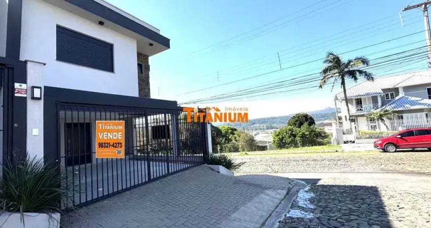 Casa nova, moderna. com 3 dormitórios, sendo duas suítes, garagem para dois carros, com bela vista, local próximo ao centro, à venda em novo hamburgo .
