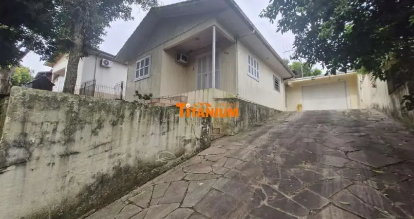 Casa para aluguel em novo hamburgo, bairro ideal, com churrasqueira e garagem coberta