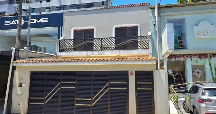 Alugo amplo sobrado para fins comerciais, 02 vagas de garagem, na rua goiás, boqueirão, santos.