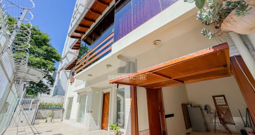 Casa Unifamiliar e Serviço no bairro Menino Deus em Porto Alegre