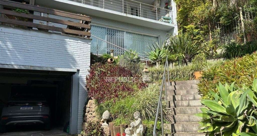 Casa com 3 quartos à venda na Rua Edgar Luiz Schneider, 480, Jardim Isabel, Porto Alegre