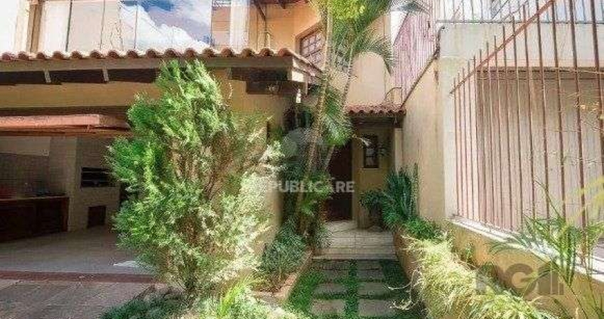 Casa 4 dormitórios à venda Rio Branco Porto Alegre/RS