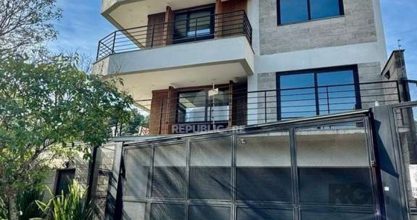 Casa 3 dormitórios à venda Guarujá Porto Alegre/RS
