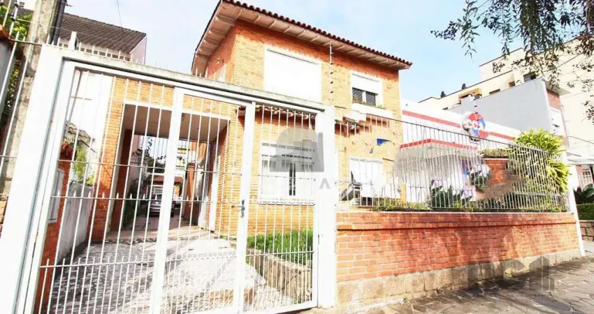 Casa à venda 4 quartos (dormitórios), suíte, 3 vagas - Partenon, Porto Alegre