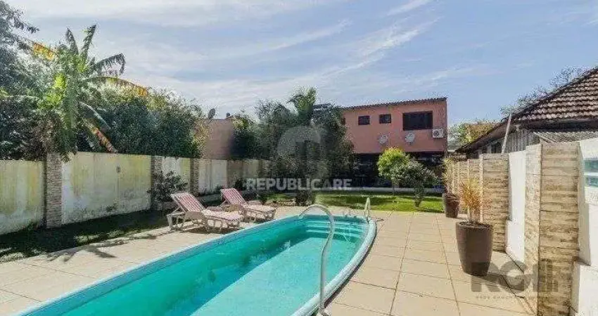 Casa com 3 quartos à venda na Rua Humberto de Campos, 1267, Partenon, Porto Alegre