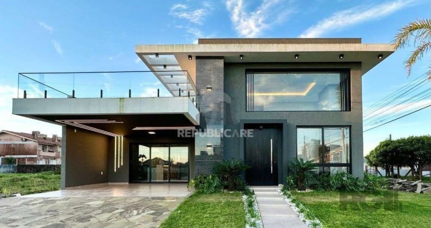 Casa 3 dormitórios à venda Zona Nova Capão da Canoa/RS